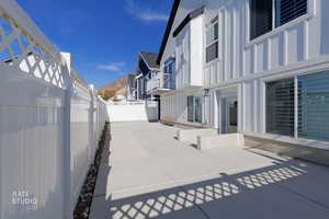 Patio / terrace with a fenced backyard, a residential view, and a patio