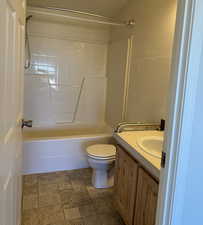 Bathroom featuring vanity and shower / bathtub combination