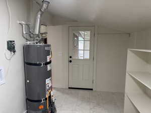 Utility room with water heater