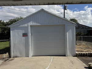 Detached garage with driveway