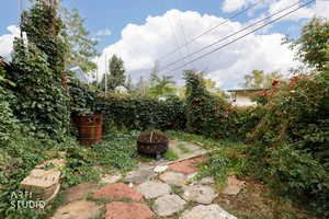 View of yard featuring a fire pit
