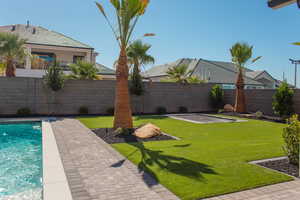 View of fenced backyard