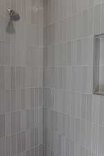 Bathroom view of a tile shower