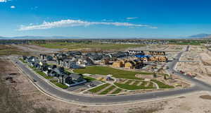 Aerial view of residential area featuring mountains