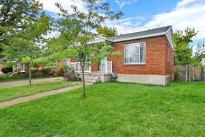 View of front of property with brick siding