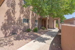 View of front of home featuring stucco siding