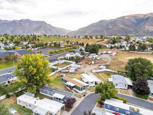 Aerial view of residential area with a mountainous background