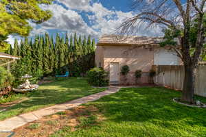 View of yard featuring a trampoline