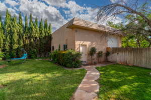 View of side of property with stucco siding