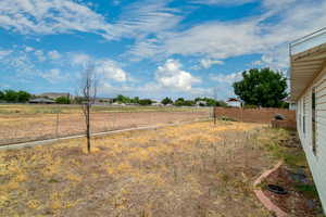 View of yard with a view of rural / pastoral area