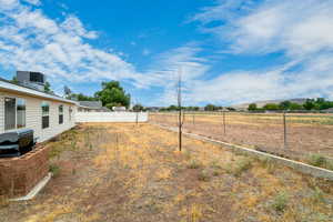 View of yard featuring a view of rural / pastoral area