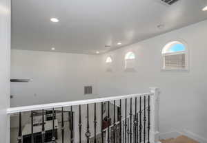 Corridor featuring recessed lighting