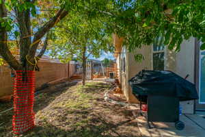 View of fenced backyard
