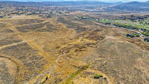 View of property location with a mountain backdrop and rural landscape