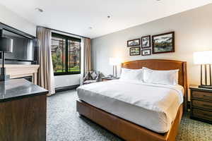 Bedroom with fireplace