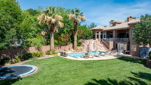 Fenced backyard with a patio, a trampoline, and stairway