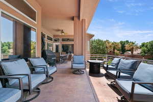 View of patio featuring an outdoor living space, ceiling fan, area for grilling, and outdoor dining space