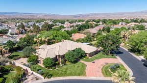 Aerial view of residential area with a mountainous background