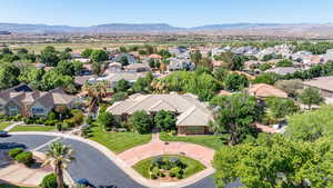 Aerial view of residential area featuring a mountain backdrop