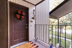 Entrance to property featuring board and batten siding