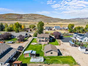 Aerial view of residential area featuring a mountain backdrop