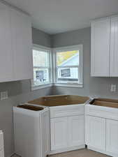 Kitchen with white cabinetry