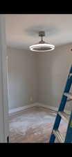 Spare room with baseboards