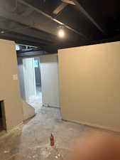 Unfinished below grade area with baseboards