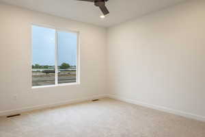 Unfurnished room featuring light colored carpet, recessed lighting, and a ceiling fan