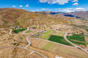 Aerial overview of property's location with mountains and rural landscape