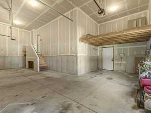 Garage featuring a garage door opener