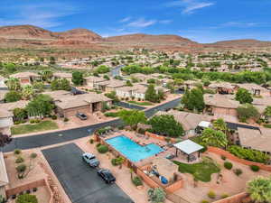 Aerial view of residential area featuring a mountain backdrop
