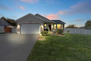 Twilight photo of the exterior of the home.