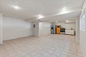 Big finished basement with room to grow into.