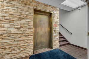 Entrance to property featuring elevator