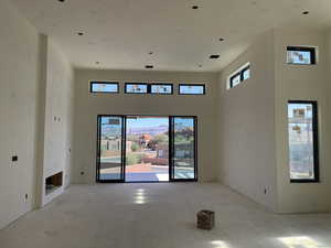 Spare room with a towering ceiling