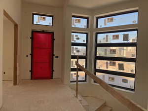 Entrance foyer featuring healthy amount of natural light