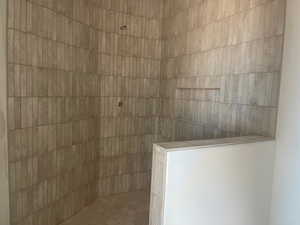 Bathroom featuring walk in shower