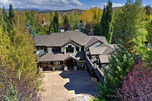 View of subject property featuring a mountainous background