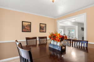 Dining room with crown molding
