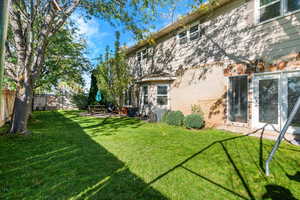Fenced backyard featuring a patio area