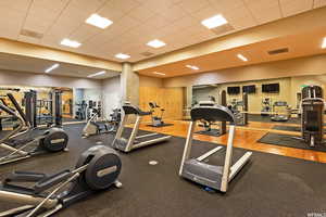 Gym featuring a paneled ceiling