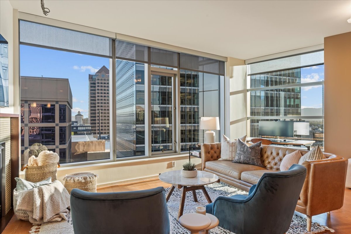 Living room featuring wood finished floors and a city view