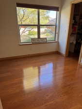 Empty room with wood finished floors