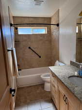 Full bath featuring bathing tub / shower combination and vanity
