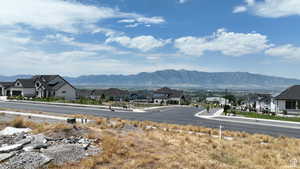 Mountain view featuring nearby suburban area