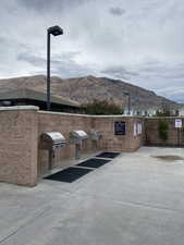 View of patio / terrace featuring a mountain view and grilling area