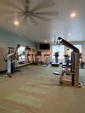 Exercise room featuring recessed lighting and a ceiling fan