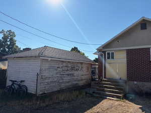 View of garage and back of home
