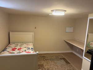 Bedroom with baseboards